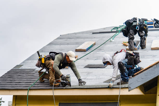 Professional Roofing technician working in Morganville, NJ